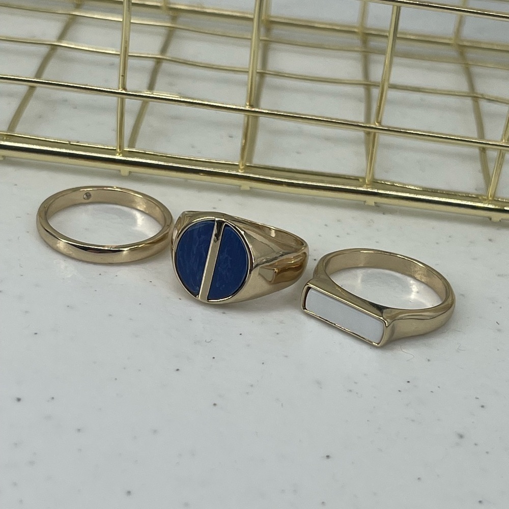 3 piece gold toned blue stone white stone ring set
